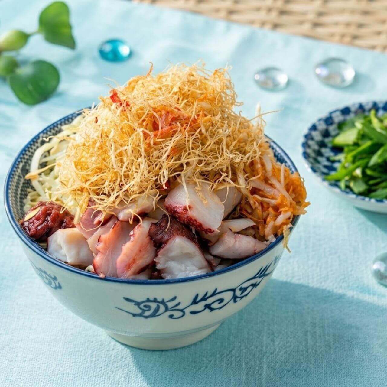 東京もんじゃ 鉄板焼酒場 どてっぱんの『梅水晶とタコのもんじゃ』